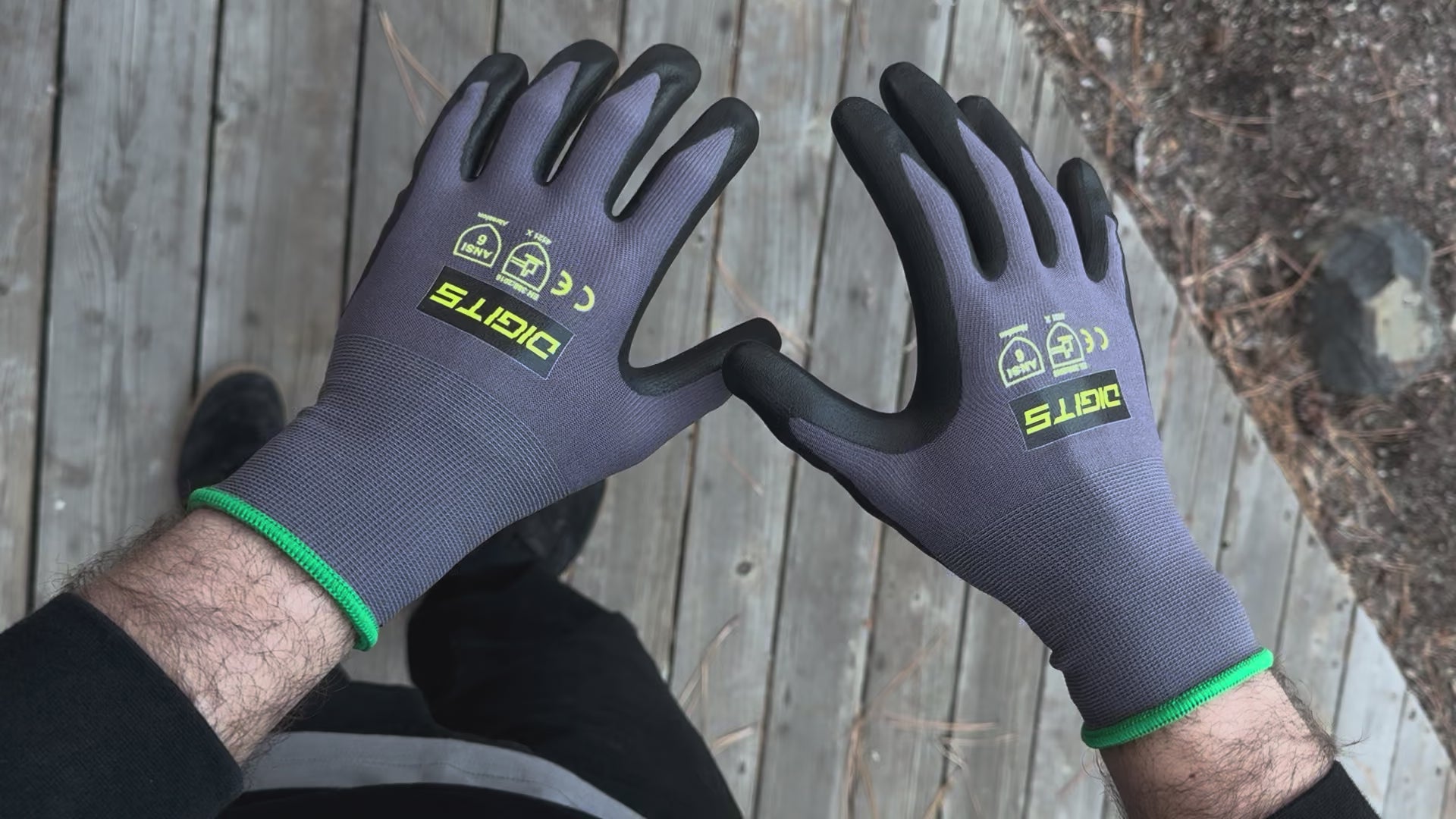 Load video: Worker wearing Digits dipped gloves demonstrating grip and flexibility during everyday work tasks